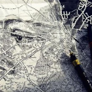 英国艺术家借助地图画出人脸肖像